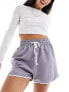 Фото #1 товара In The Style drawstring piping detail runner shorts in slate blue