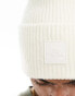 The North Face Urban Patch oversized beanie in off white