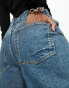 ASOS DESIGN Tall mid rise baggy boyfriend jeans in mid blue