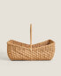 Woven rattan basket with handle