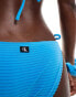 Фото #2 товара Calvin Klein CK monogram rib tie side bikini bottom in blue