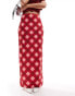 The Frolic check print satin midaxi skirt in red and pink