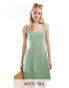 Фото #1 товара ASOS DESIGN Tall seamed mini tennis sundress in khaki