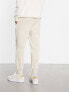 Puma essentials small logo joggers in off white