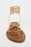 Lace-up flat sandals