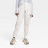 Фото #1 товара Women's Lined Winter Woven Joggers - All in Motion Cream L
