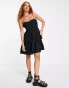 Фото #1 товара Reclaimed Vintage inspired mini dress with peplum hem and broderie detail in black