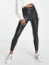 Фото #2 товара River Island Petite faux leather zip detail trouser in black