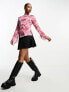 Monki long sleeve boat neck top in red and pink rose print