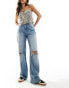 Фото #1 товара Bershka ripped knee wide leg jeans in mid wash