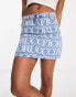 Фото #1 товара Fiorucci monogram denim mini skirt in light vintage