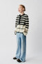 Striped knit cardigan with ruffles