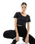 Фото #2 товара Nike Training One Dri-Fit slim twist back crop t-shirt in black