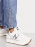 New Balance 574+ trainers in off white zebra