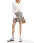 Фото #1 товара Stradivarius tailored pleated mini skirt in stone check print