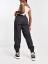 Фото #3 товара Nike Swoosh woven cargo trousers in black