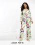 Фото #1 товара ASOS DESIGN Petite Christmas satin botanical bauble shirt & trouser pyjama set in cream