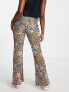 Фото #2 товара Monki Ocean plisse flare trousers in rainbow floral