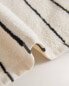 Towel with irregular stripes