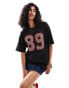 ASOS DESIGN oversized tee with contrast stitch leopard number applique in black