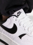 Nike Gamma Force trainers in white and black