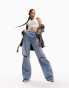 ASOS DESIGN wide leg dad jeans with rips in mid blue