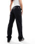 Фото #1 товара Tommy Jeans Harper high rise cargo trousers in black