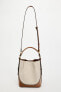 Canvas bucket bag with topstitching