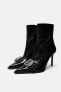 High heel ankle boots with buckle