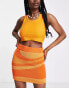 Weekday knitted mini skirt in orange swirl