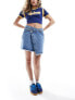 Something New Denim asymmetric mini skirt in medium blue wash