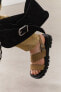 Asymmetric leather sandals