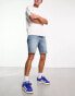 Фото #4 товара ASOS DESIGN skinny regular length denim shorts in mid wash blue