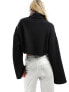 Фото #7 товара Tommy Jeans relaxed cropped badge turtleneck in black