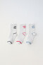 Pack of three pairs of sports socks with slogan