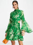 Фото #1 товара ASOS DESIGN scallop trim high neck mini dress with cut out waist detail with floral print in green
