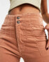 Free People cord high-waisted flares in tan