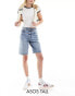 Фото #1 товара ASOS DESIGN Tall denim bermuda short in midwash blue