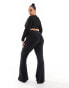 Фото #4 товара ASOS DESIGN Curve rib flare trouser with lettuce hem in black