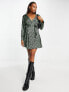 Фото #1 товара Monki satin wrap mini dress in green swirl