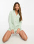 Chelsea Peers button front long sleeve romper with pocket detail in sage green