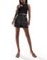 Фото #1 товара In The Style leather look turn up shorts in black