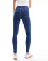 ASOS DESIGN skinny jeans in mid blue