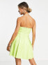 ASOS DESIGN corset PU bandeau mini dress with pleat skirt in green