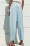 Braided belt trousers