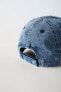 Denim cap with embroidered heart motif
