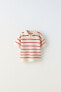 Textured striped knit polo shirt