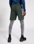 Hummel polyester mesh mid length training short in dark green