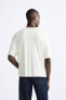 T-SHIRT WITH BUTTONED NECK