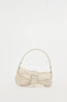 Distressed asymmetric shoulder bag